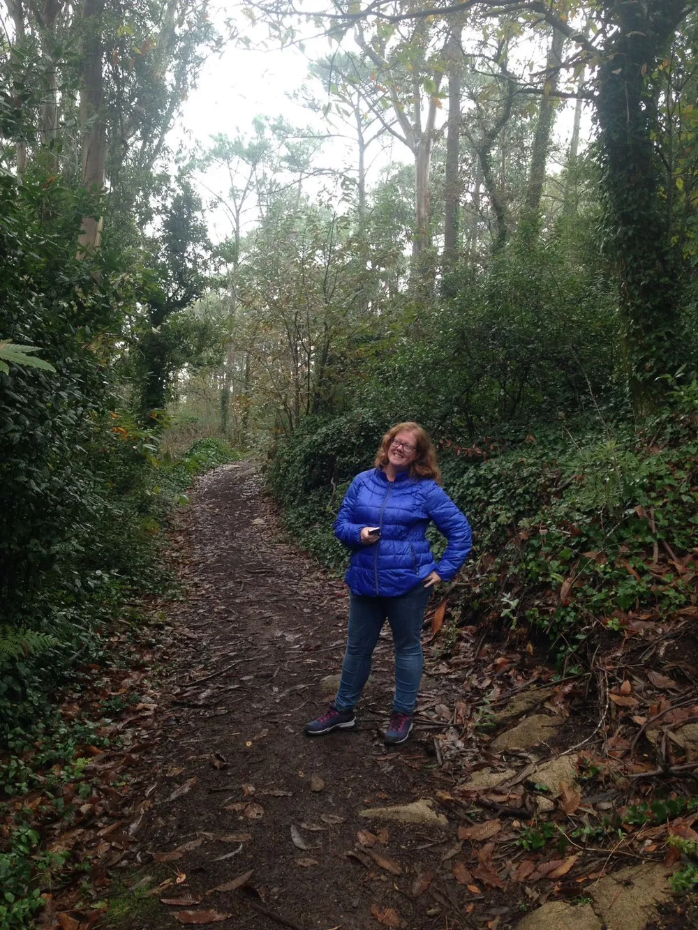 red hair woman in the woods